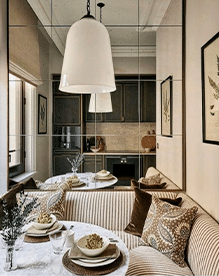Warm Neutral Dining Space with Wood, Soft Textures, and Ambient Lighting Neutral dining area with warm beige tones, wooden table, soft textiles, and layered lighting creating a cozy and refined atmosphere.