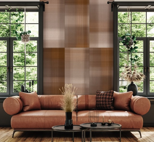 Modern industrial living room interior, wall mockup, 3d render Tile wall with textile-inspired pattern in warm suede tones behind a sofa, creating a soft, layered backdrop that mimics fabric