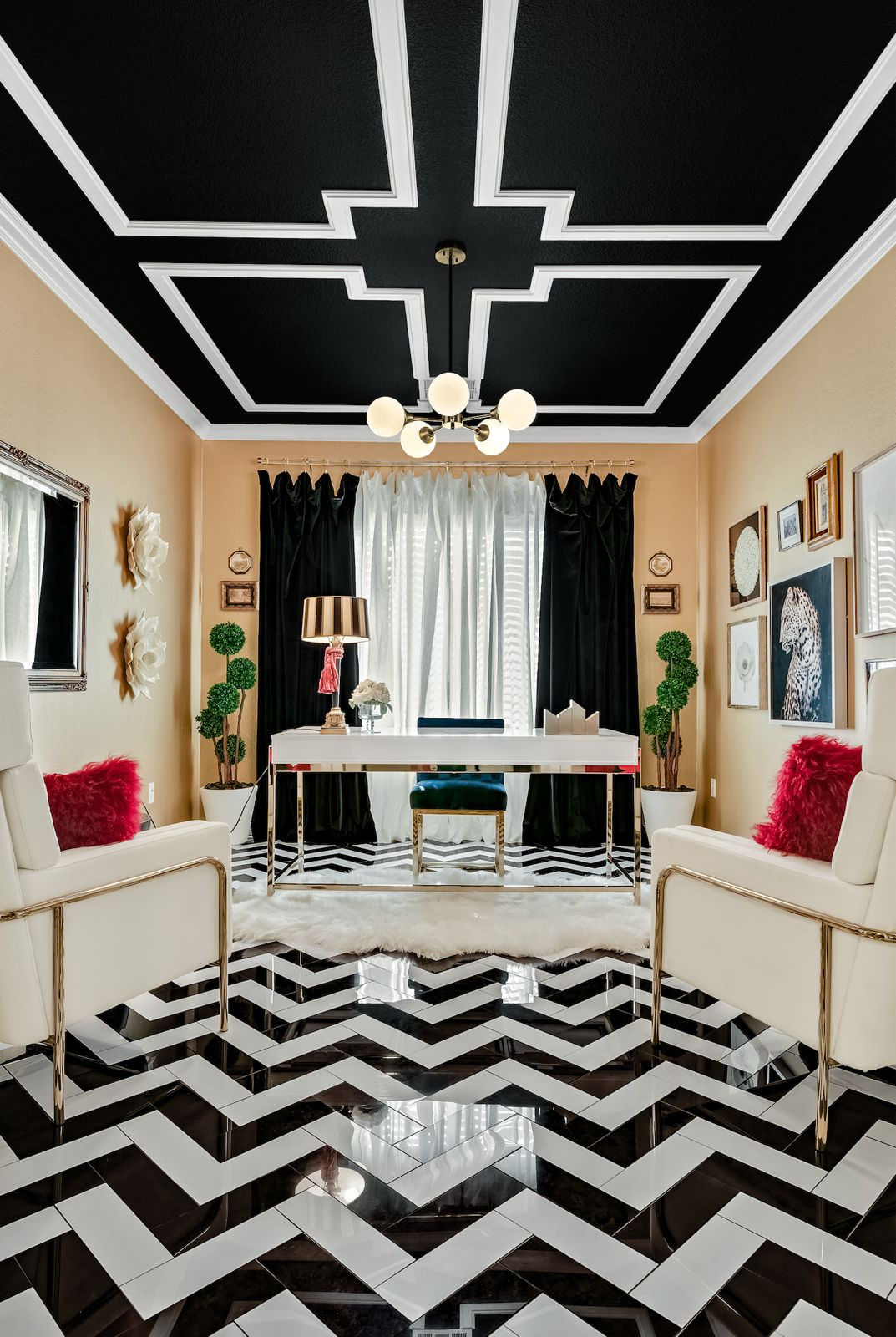 Black and White Home Office by Fabiola Avelino Interiors Bold black-and-white home office with red accents designed by Fabiola Avelino
